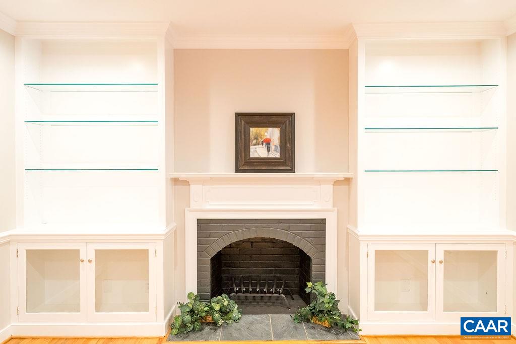 780 Broomley Road Charlottesville, VA 22901 - Photo 9 of 44 a white building with a fireplace