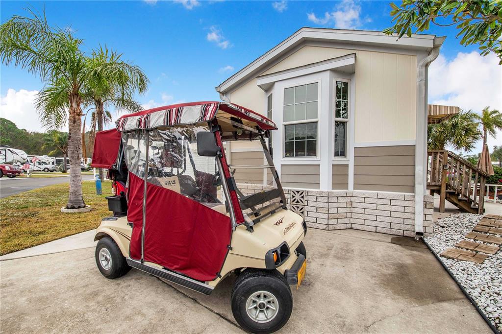 178 Lily Creek Way Frostproof, FL 33843 - Photo 20 of 35 a car parked in front of a house