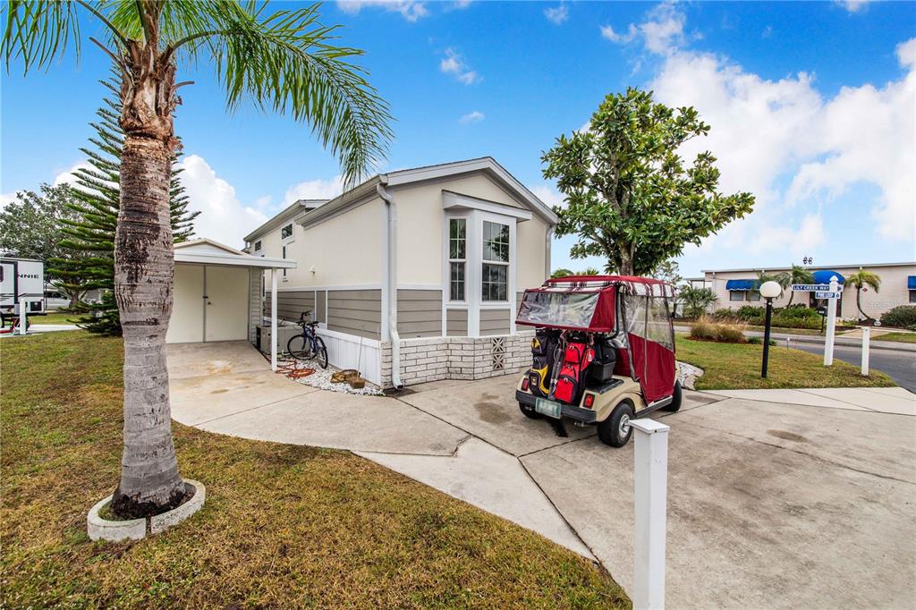 178 Lily Creek Way Frostproof, FL 33843 - Photo 7 of 35 a view of a house with backyard and swimming pool