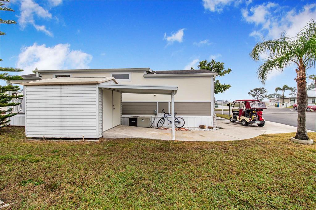 178 Lily Creek Way Frostproof, FL 33843 - Photo 8 of 35 a view of a house with a patio