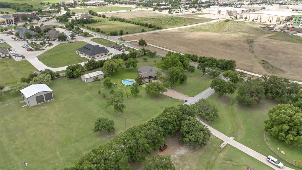 108 Carlin Road Mansfield, TX 76063 - Photo 24 of 40 an aerial view of residential houses with outdoor space