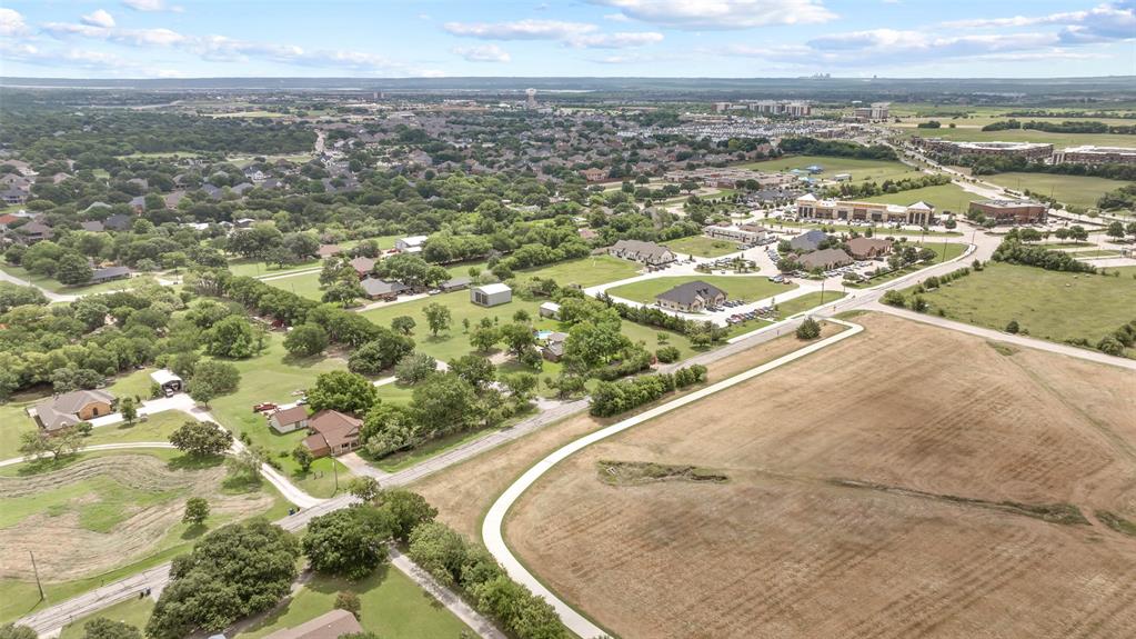 108 Carlin Road Mansfield, TX 76063 - Photo 28 of 40 an aerial view of residential houses with outdoor space