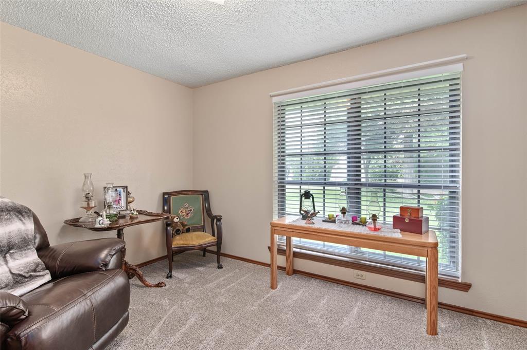 108 Carlin Road Mansfield, TX 76063 - Photo 32 of 40 a room with furniture and window