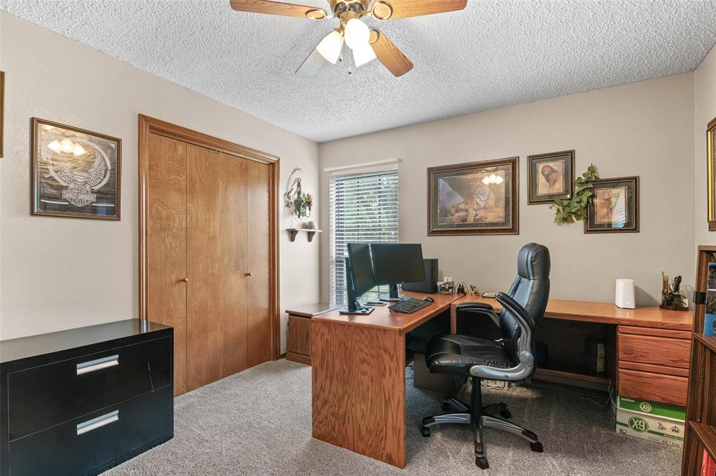 108 Carlin Road Mansfield, TX 76063 - Photo 34 of 40 a view of a workspace with furniture and a window