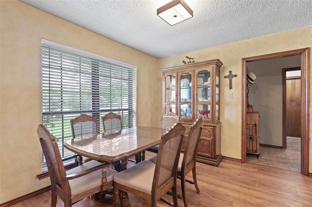 108 Carlin Road Mansfield, TX 76063 - Photo 37 of 40 a dining room with furniture and window