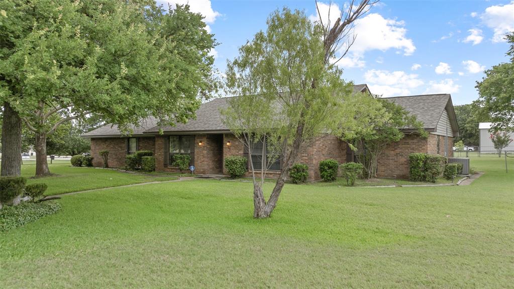 108 Carlin Road Mansfield, TX 76063 - Photo 39 of 40 a view of a house with a yard and tree s
