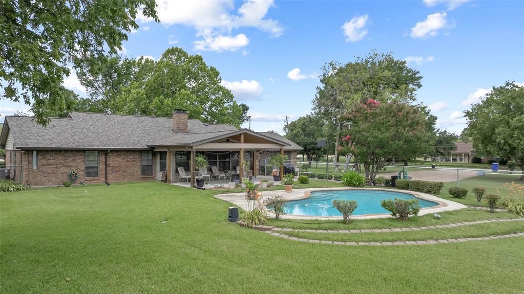 108 Carlin Road Mansfield, TX 76063 - Photo 5 of 40 a view of a house with a swimming pool