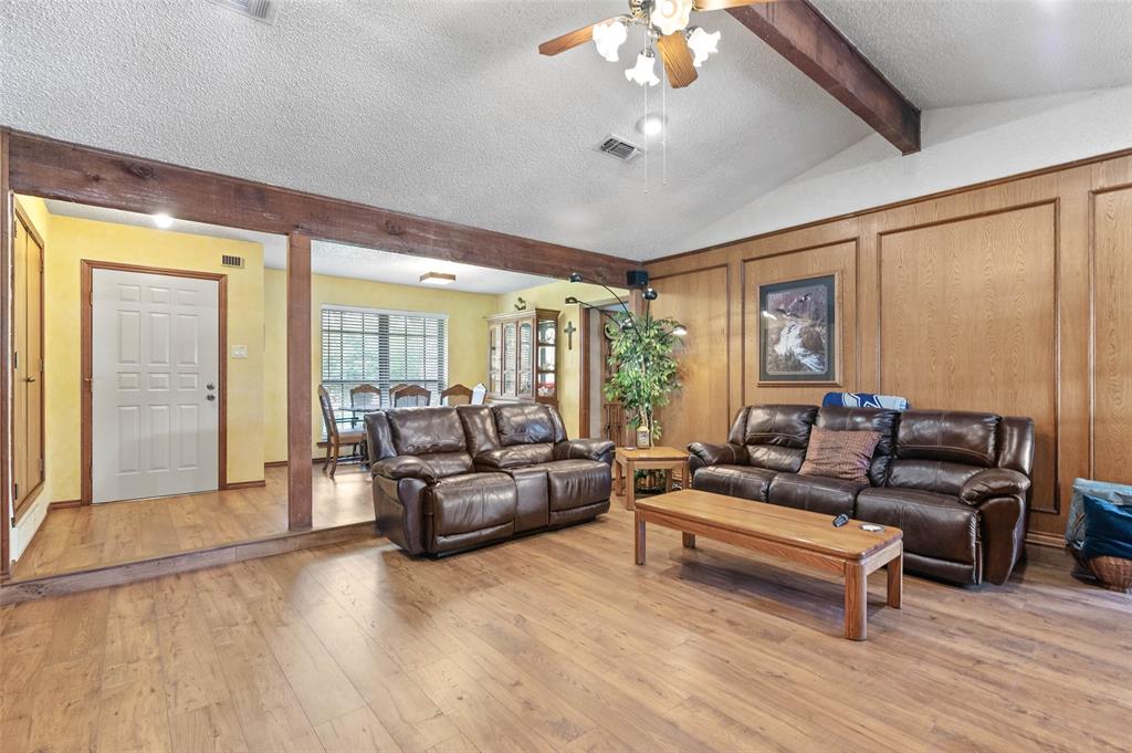 108 Carlin Road Mansfield, TX 76063 - Photo 6 of 40 a living room with furniture and a large window