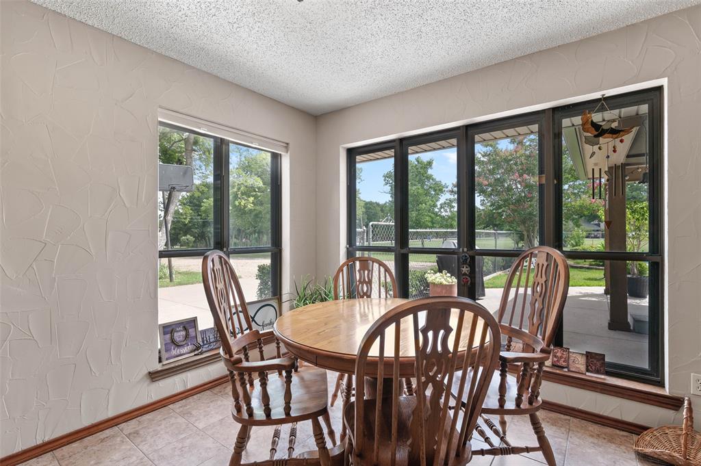 108 Carlin Road Mansfield, TX 76063 - Photo 10 of 40 a view of a city from a dining room with furniture window and outside view