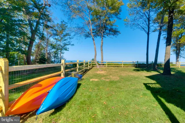 a view of a chairs and table on the wooden floor