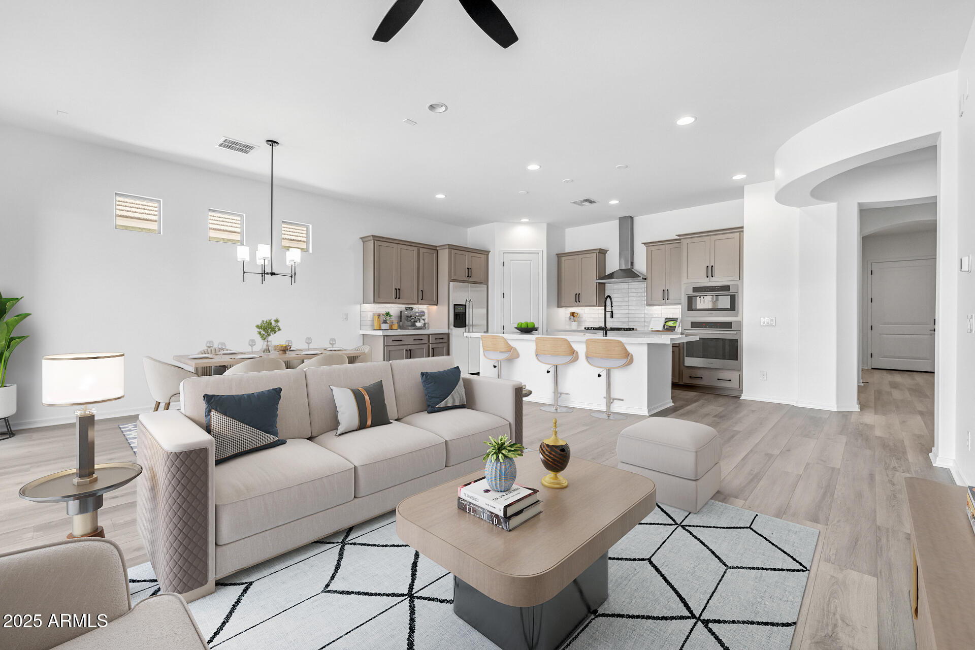 4252 East Bernice Street Gilbert, AZ 85295 - Photo 11 of 72 a living room with stainless steel appliances kitchen island furniture and a view of kitchen