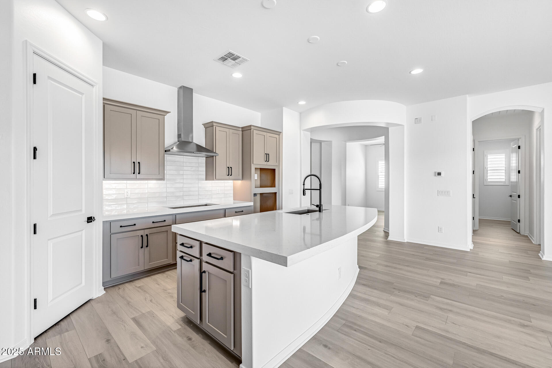 4252 East Bernice Street Gilbert, AZ 85295 - Photo 19 of 72 a kitchen with stainless steel appliances granite countertop a sink and stove