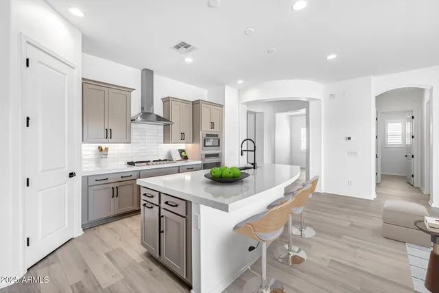 a view of a livingroom with wooden floor