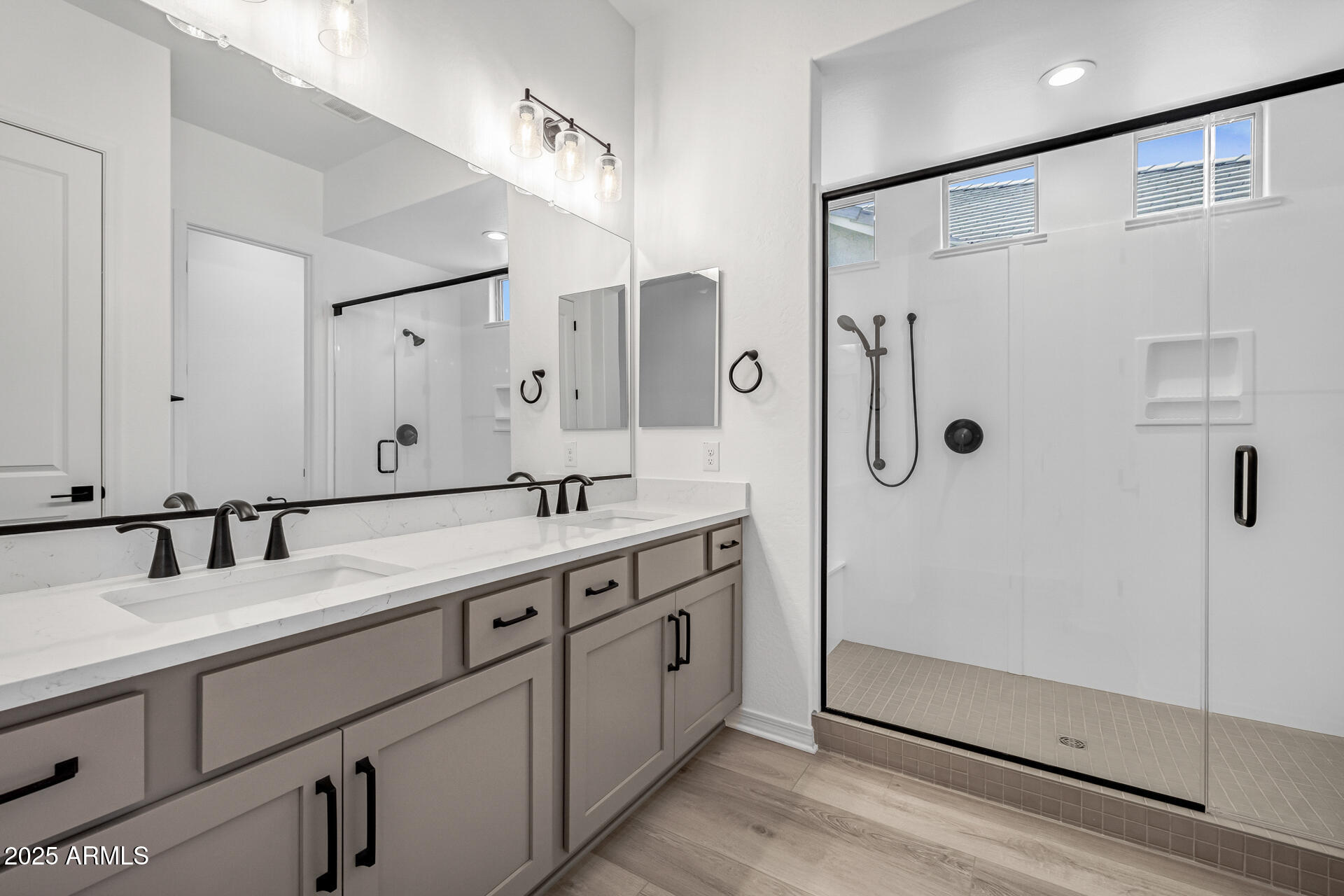 4252 East Bernice Street Gilbert, AZ 85295 - Photo 29 of 72 a bathroom with a double vanity sink mirror and double