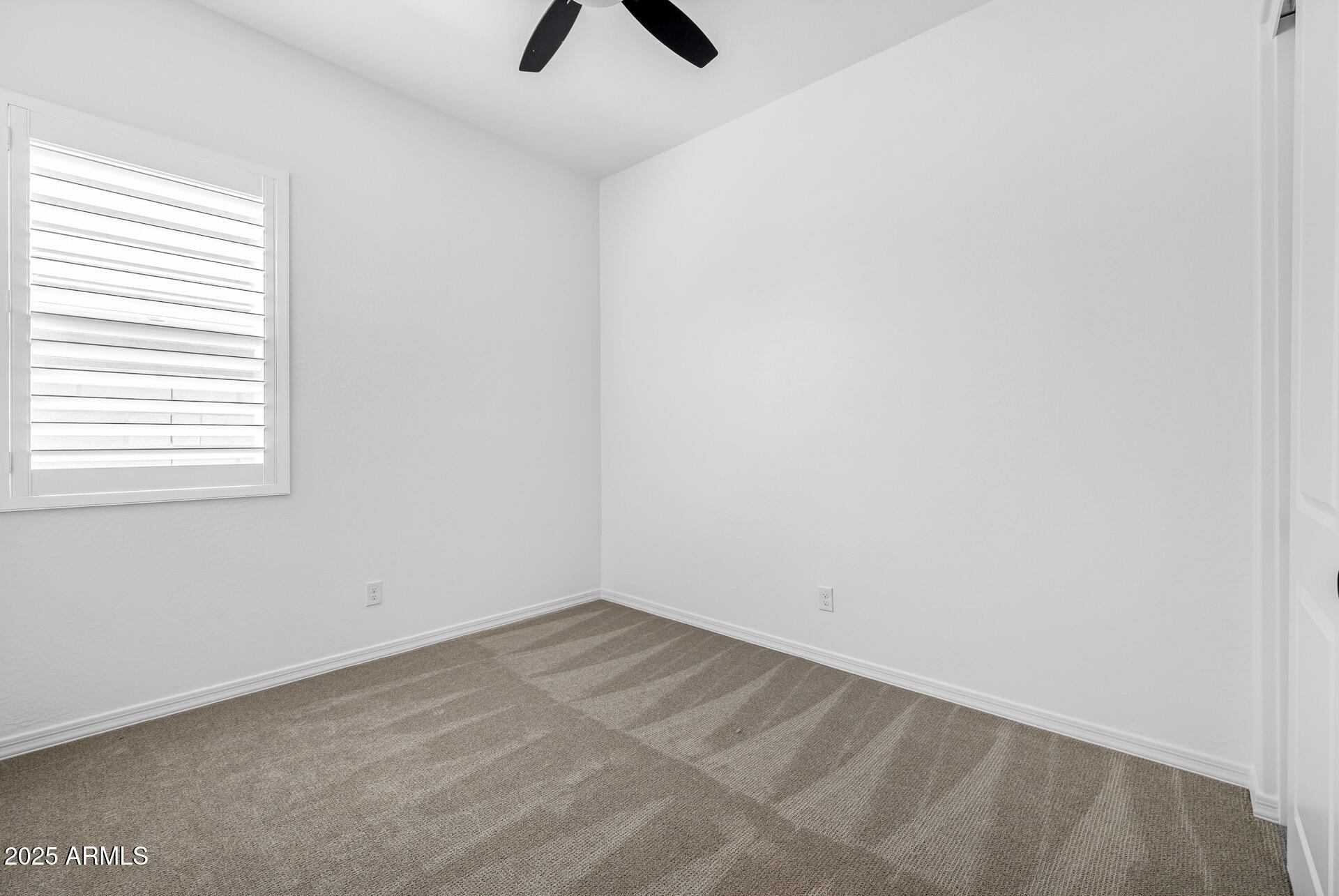 4252 East Bernice Street Gilbert, AZ 85295 - Photo 33 of 72 an empty room with a window
