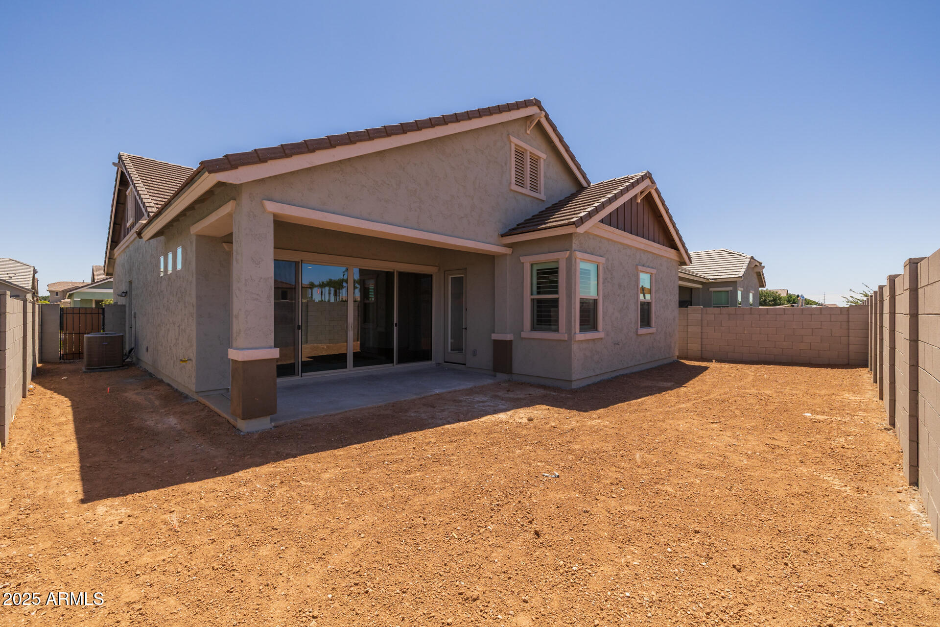 4252 East Bernice Street Gilbert, AZ 85295 - Photo 42 of 72 a front view of a house with a yard and garage