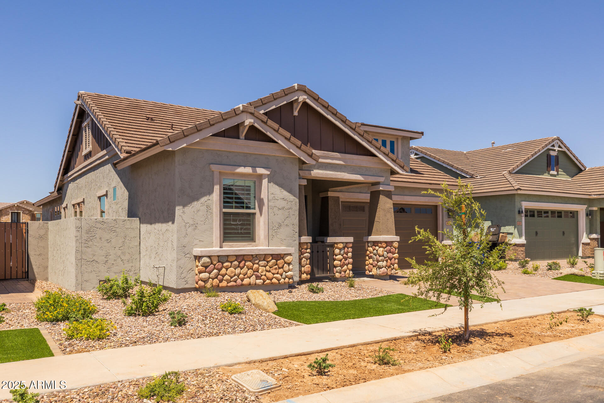 4252 East Bernice Street Gilbert, AZ 85295 - Photo 8 of 72 a front view of a house with garden
