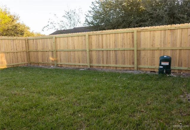 a view of kitchen view wooden floor and window