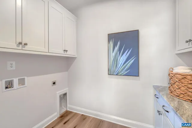 a view of cabinets and wooden floor