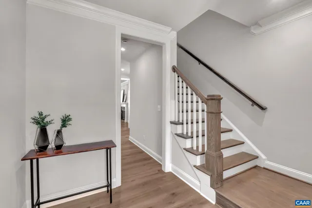 a view of entryway with wooden floor
