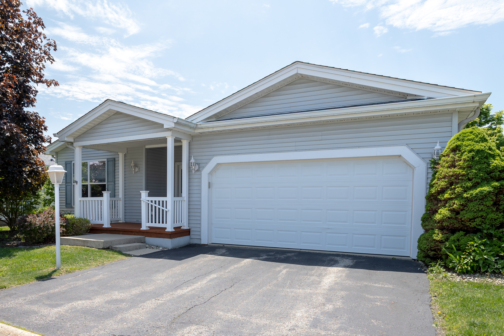212 Rodeo Drive, Unit 2179 Grayslake, IL 60030 - Photo 2 of 31 front view of house with a yard