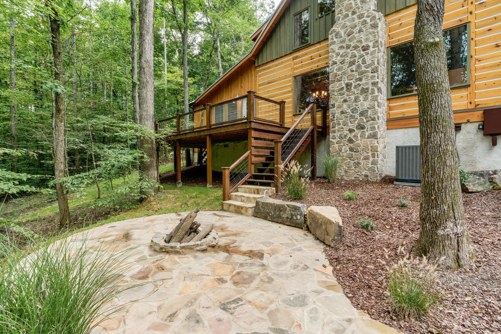 5475 Parker Branch Road Franklin, TN 37064 - Photo 27 of 29 Stone fire pit and wrap around deck