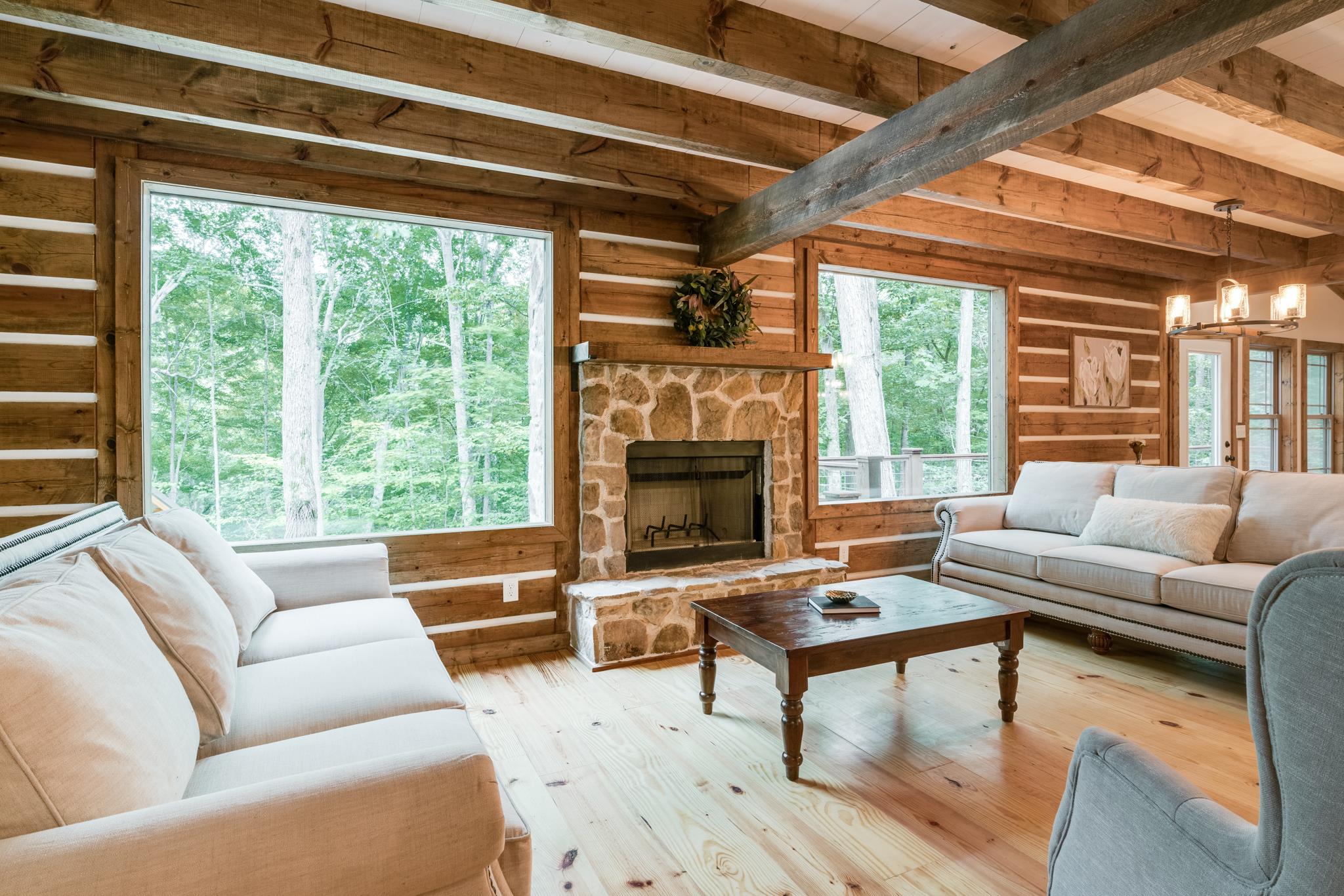 5475 Parker Branch Road Franklin, TN 37064 - Photo 6 of 29 Open living room with stone fireplace and custom paneless windows