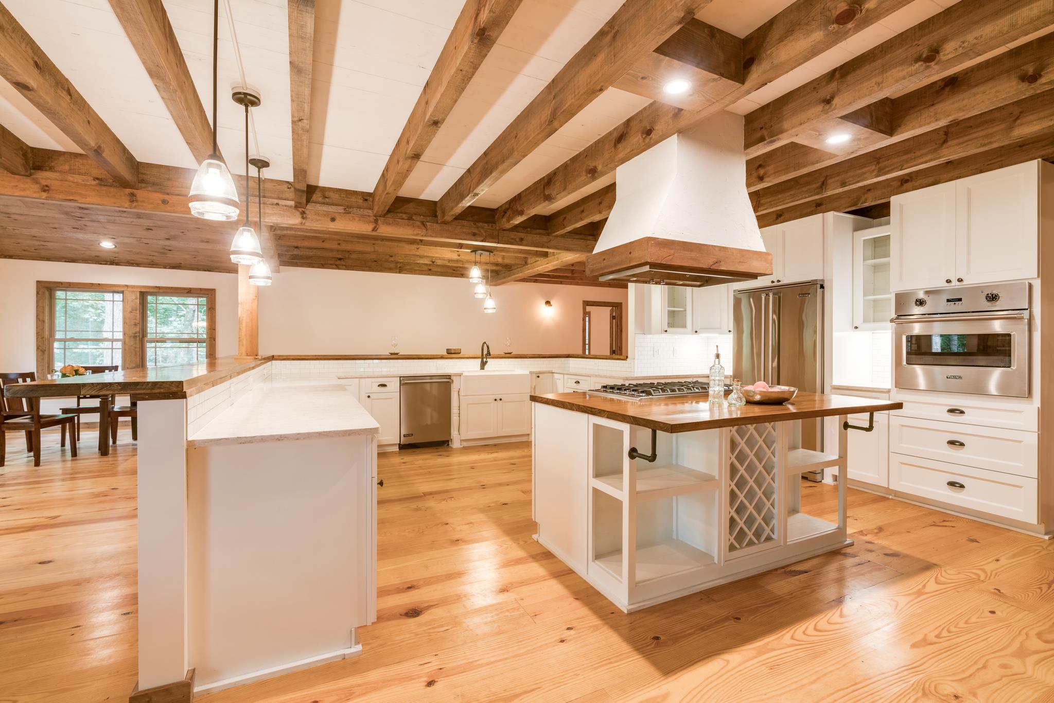 5475 Parker Branch Road Franklin, TN 37064 - Photo 9 of 29 20 person seater bar top surrounds the beautiful kitchen
