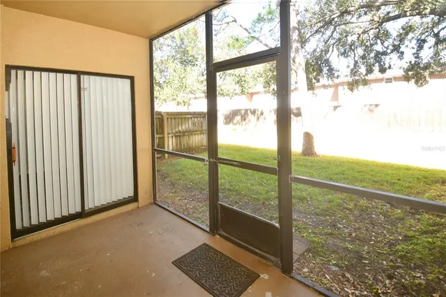a view of backyard with cabin