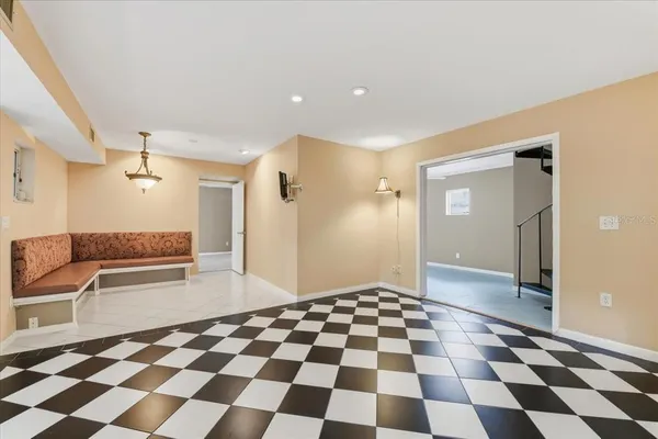 a living room with a couch and a flat screen tv