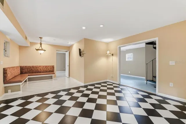 a living room with a couch and a flat screen tv