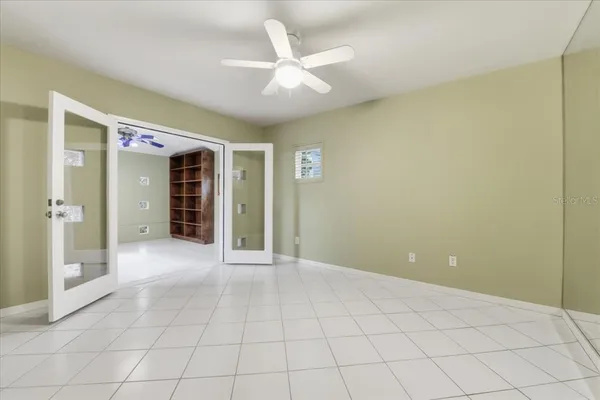 a view of an empty room with a bathroom