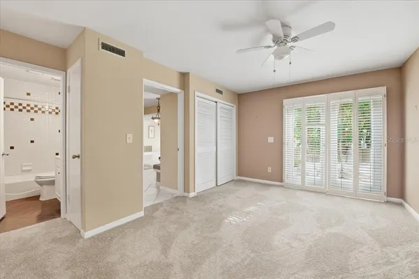 a view of a big room with carpet