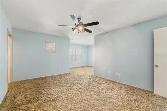 a utility room with sink dryer and washer