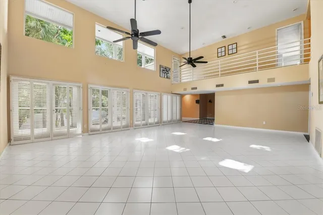 a view of an empty room with a couch