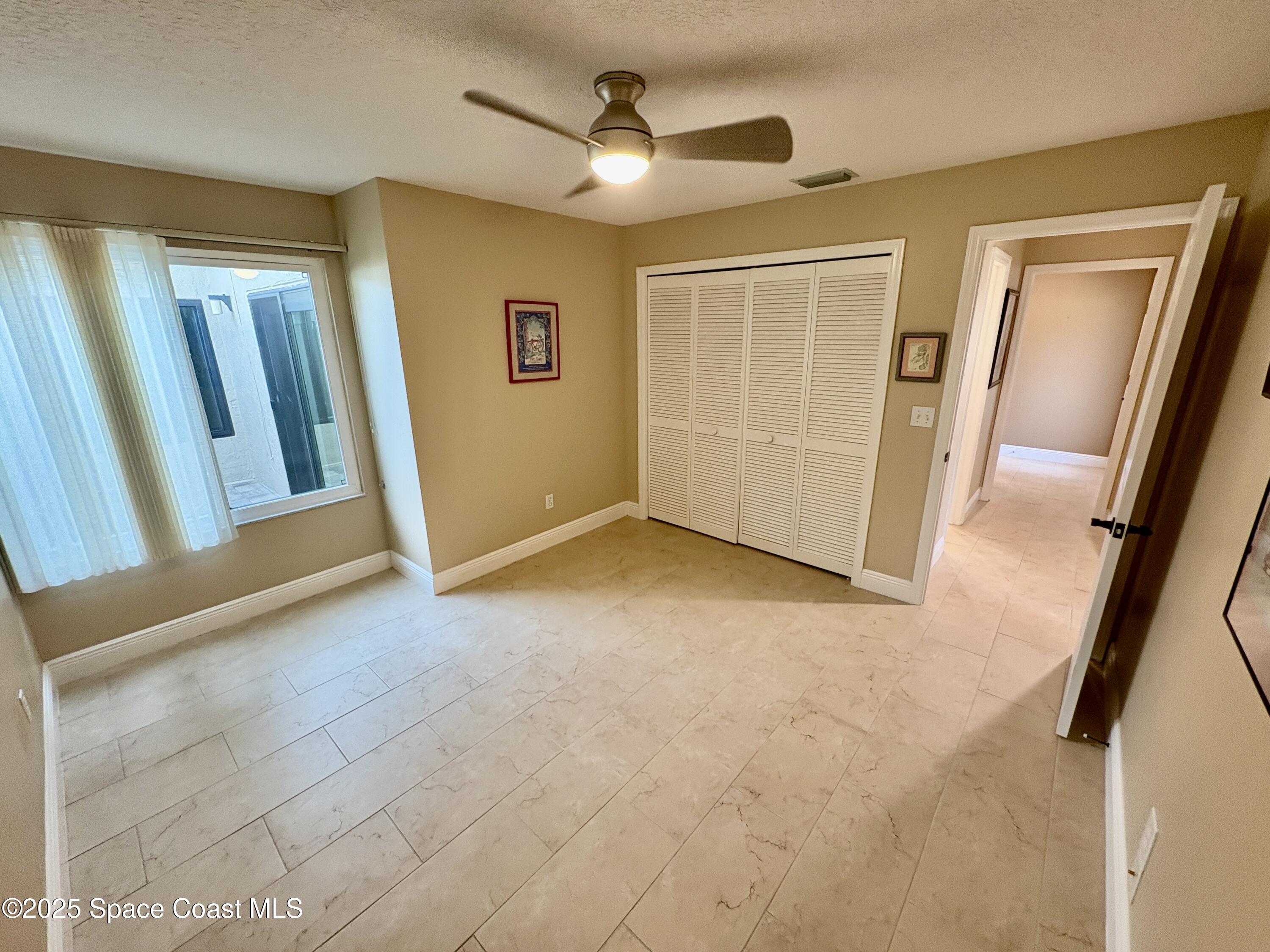 349 Country Walk Street Melbourne, FL 32940 - Photo 13 of 20 a view of entryway with front door