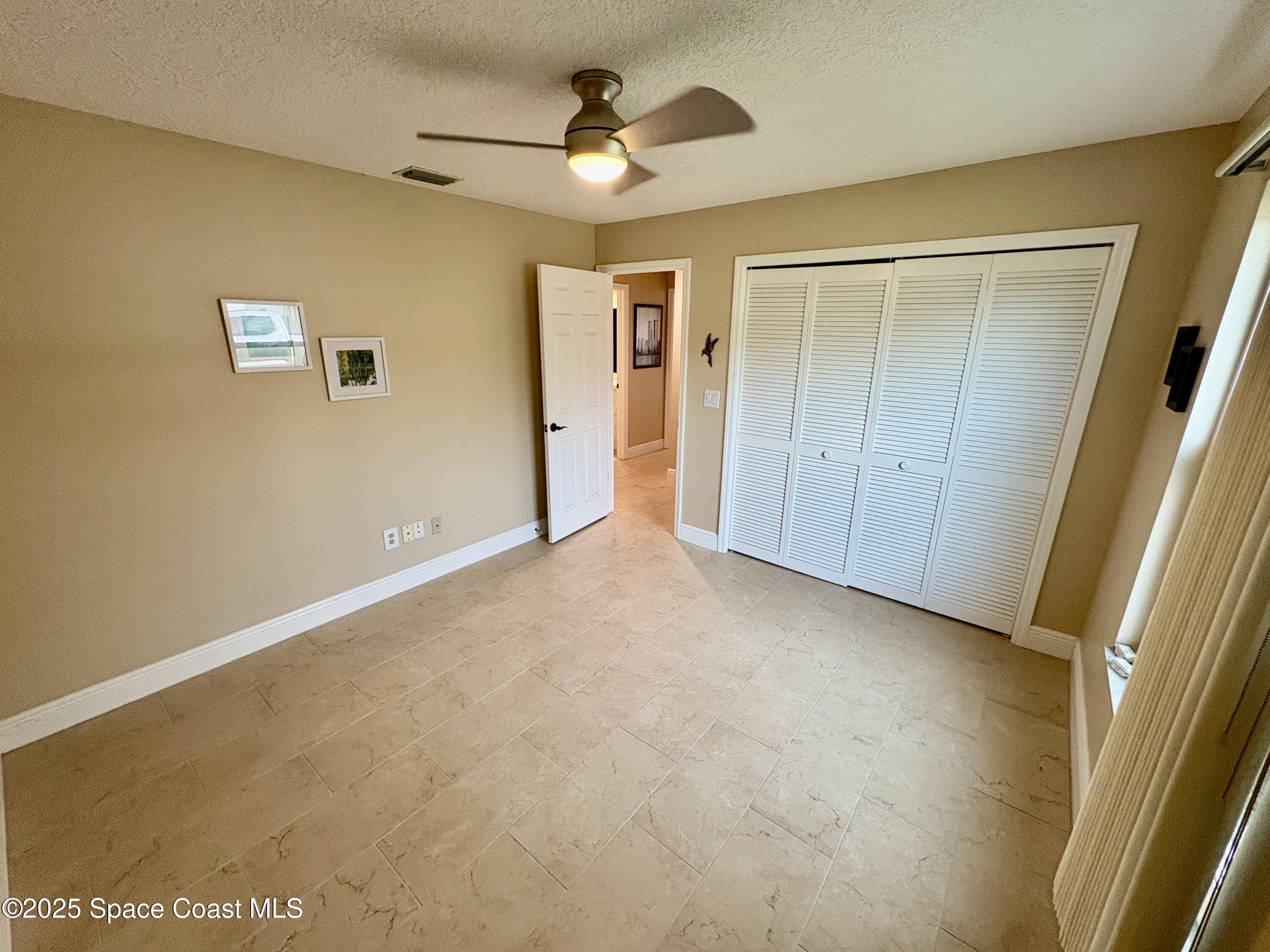 349 Country Walk Street Melbourne, FL 32940 - Photo 16 of 20 a view of an empty room