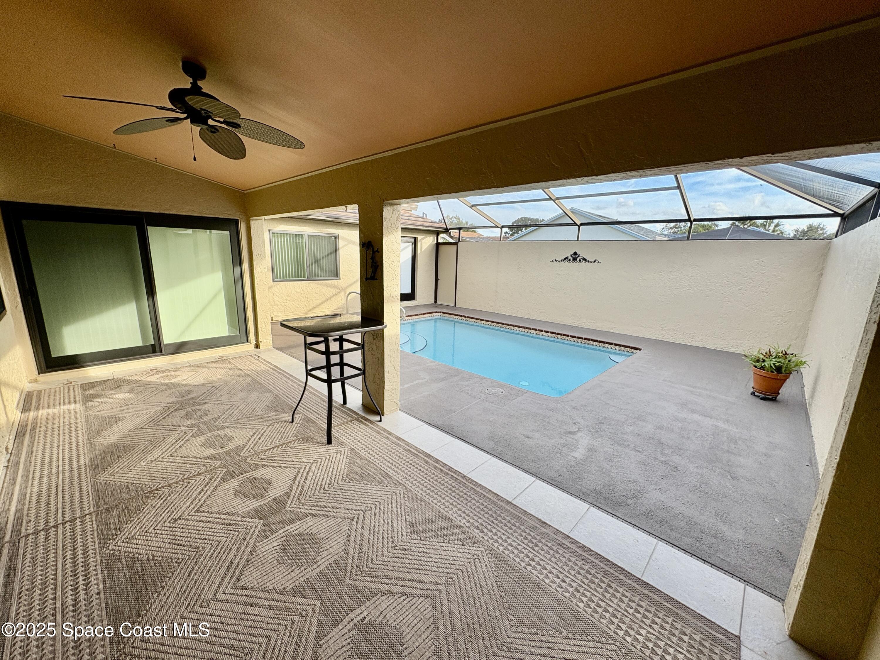 349 Country Walk Street Melbourne, FL 32940 - Photo 17 of 20 a view of a room with a window and wooden floor