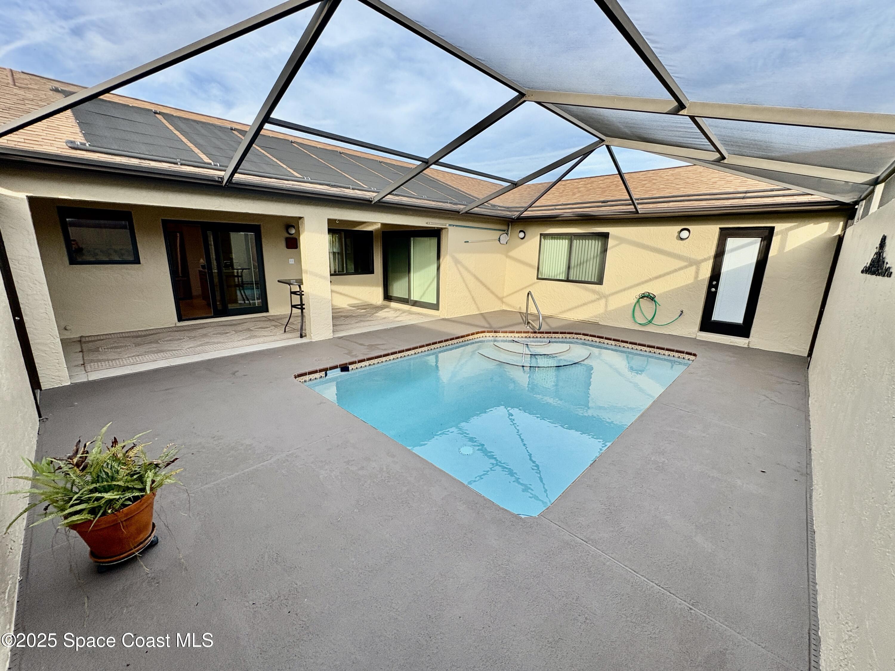 349 Country Walk Street Melbourne, FL 32940 - Photo 18 of 20 a view of a patio with a sink and a potted plant