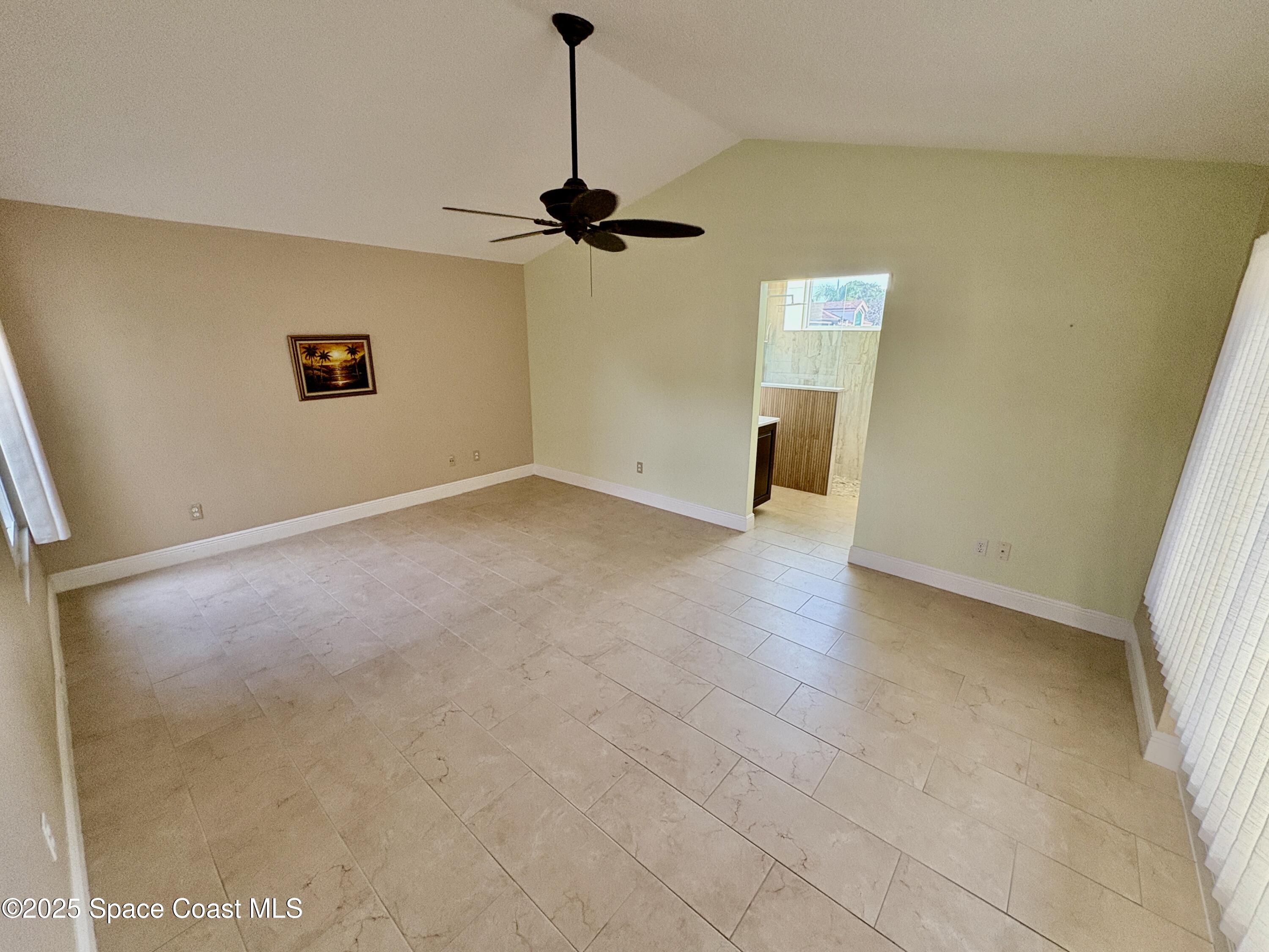 349 Country Walk Street Melbourne, FL 32940 - Photo 7 of 20 a view of a room with a hallway