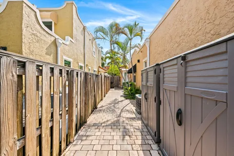 a view of a pathway of a house with wooden floor