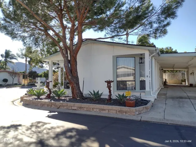 a sign on the side of the road