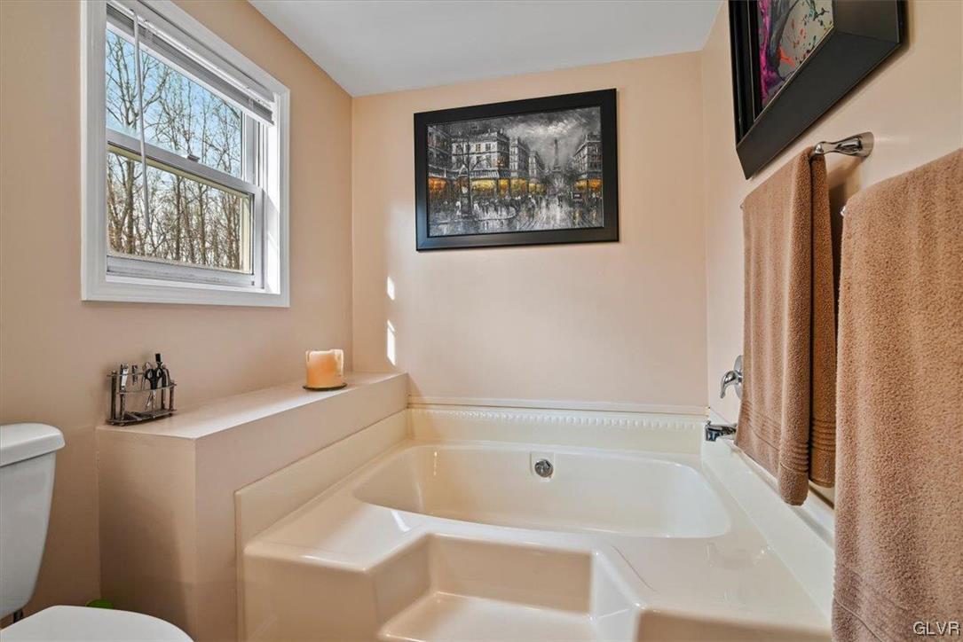 173 Shenkel Road Effort, PA 18330 - Photo 23 of 46 a bathroom with a sink and a bathtub