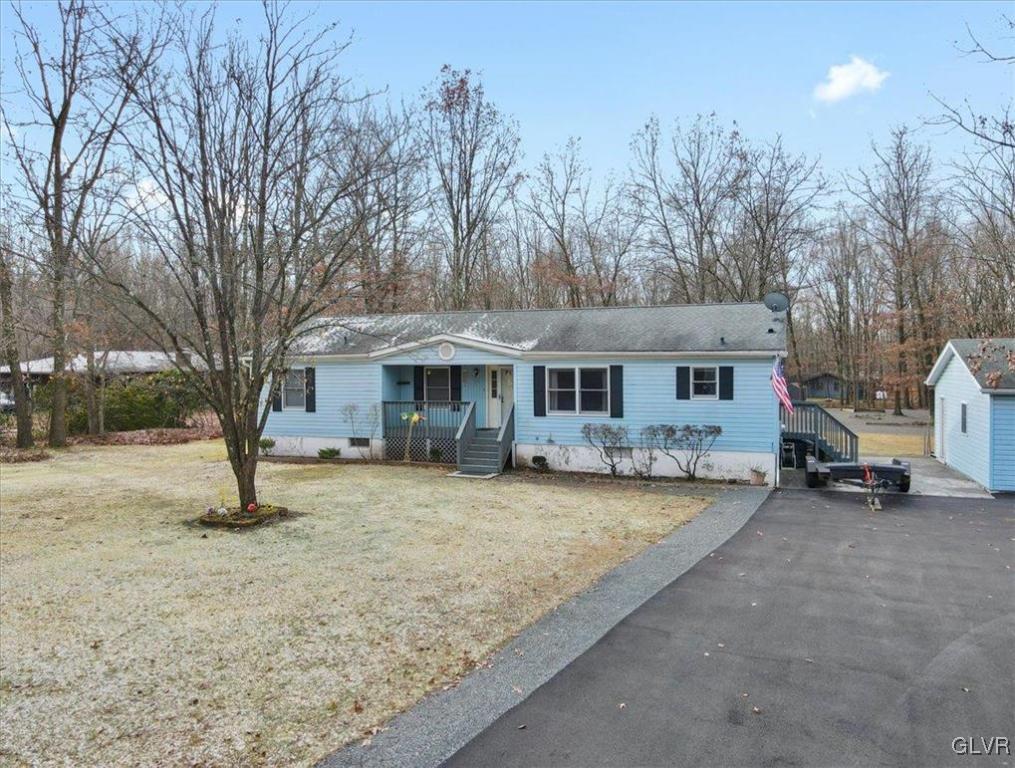 173 Shenkel Road Effort, PA 18330 - Photo 4 of 46 a view of a house with backyard and a tree