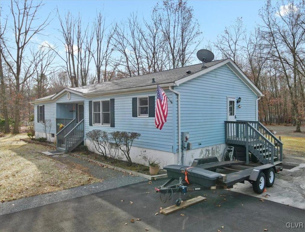 173 Shenkel Road Effort, PA 18330 - Photo 5 of 46 a view of a house with a patio