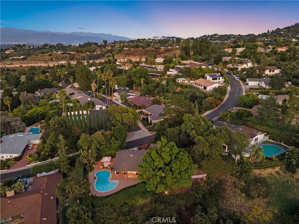 3701 Royal Meadow Road Sherman Oaks, CA 91403 - Photo 12 of 15 an aerial view of residential houses with outdoor space and trees