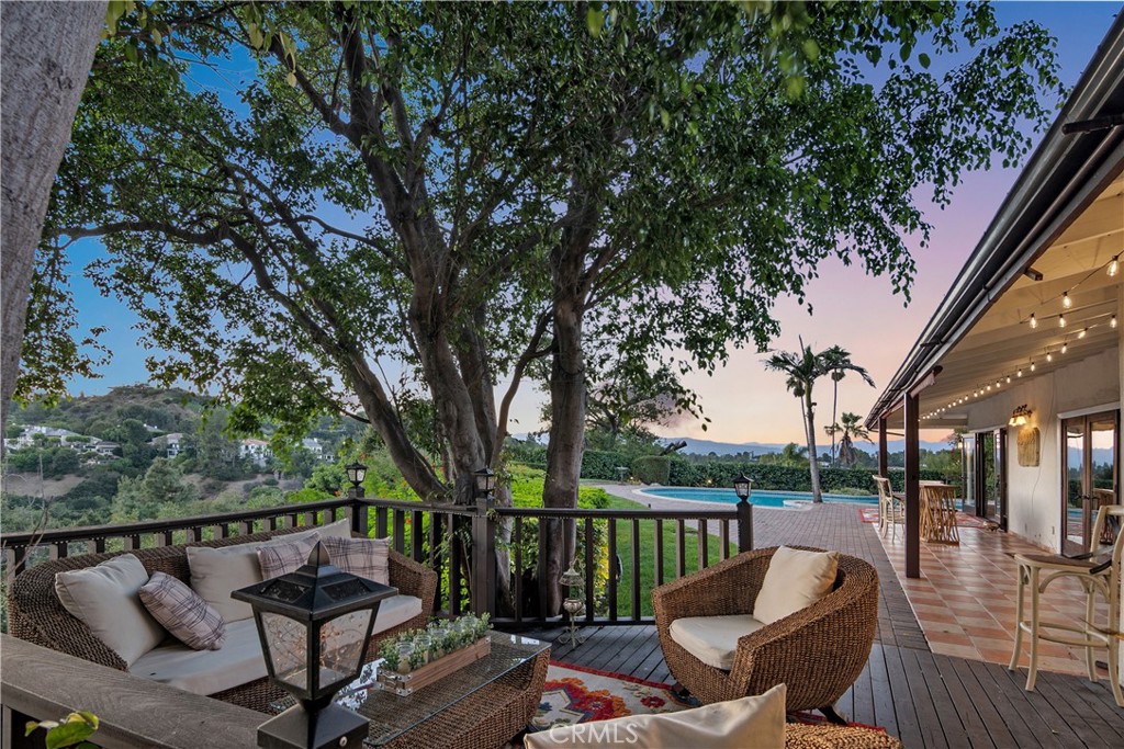 3701 Royal Meadow Road Sherman Oaks, CA 91403 - Photo 14 of 15 a view of a balcony with mountain view and wooden floor