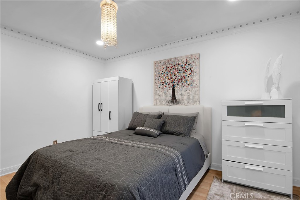 3701 Royal Meadow Road Sherman Oaks, CA 91403 - Photo 31 of 43 a bedroom with a bed and a window