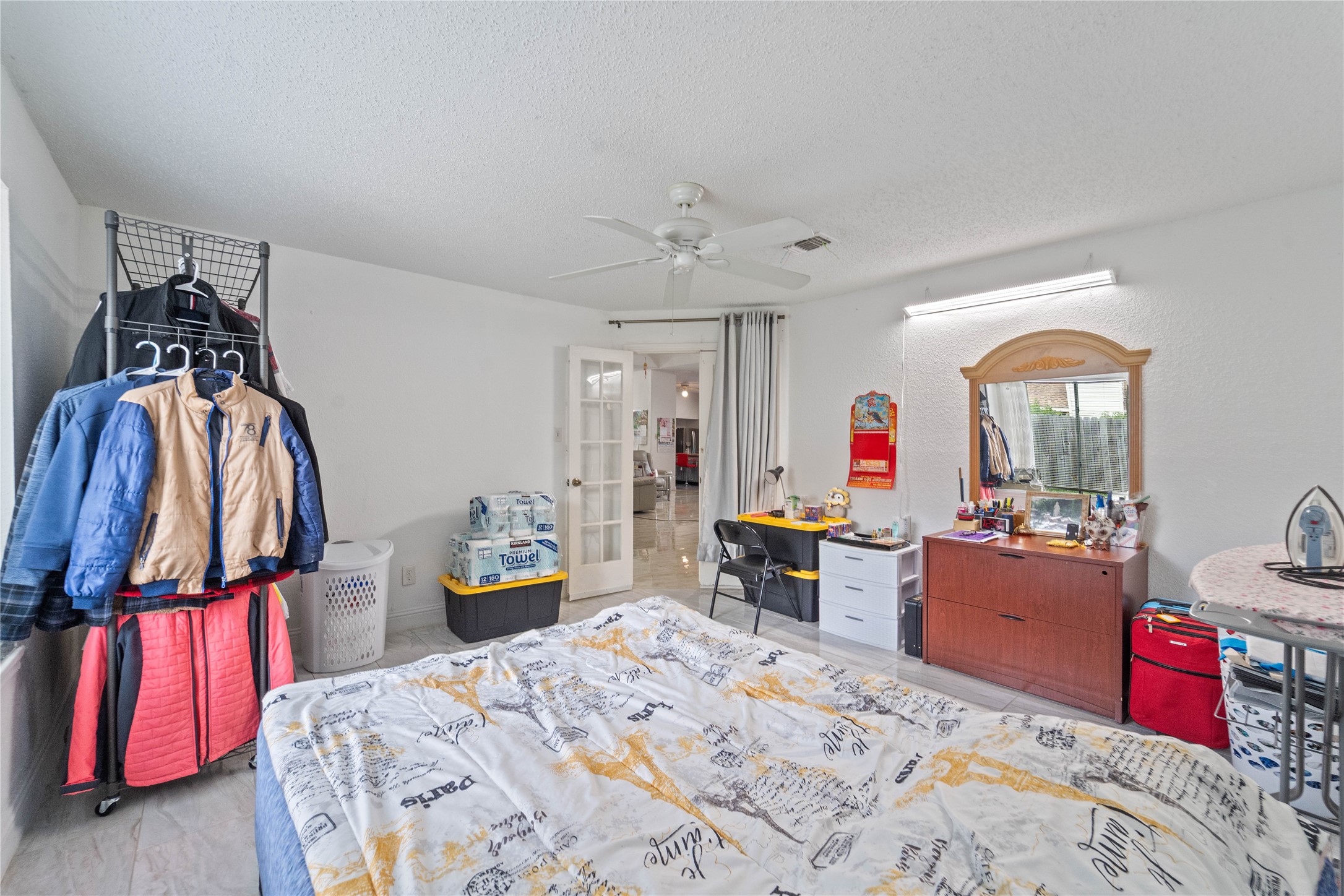 6331 Modesto Drive Houston, TX 77083 - Photo 16 of 31 a bedroom with a bed and furniture