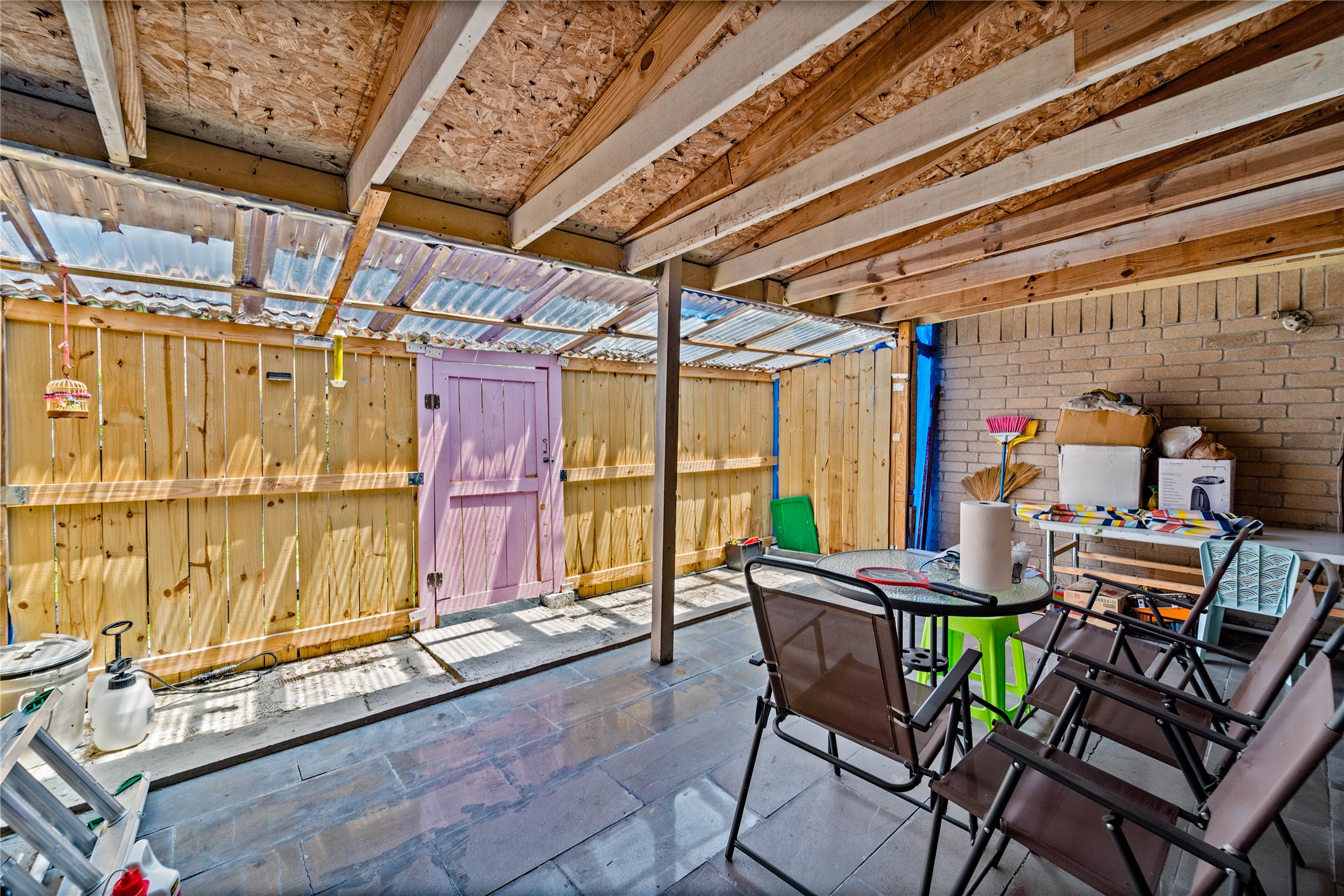6331 Modesto Drive Houston, TX 77083 - Photo 28 of 31 a dining room with furniture and a chandelier